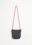 Pochette bandoulière en laine noire/blanche