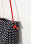 Pochette bandoulière en laine noire/blanche