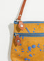 Sac à bandoulière à éclaboussures d'encre moutarde/bleu