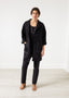 Manteau fleuri en néoprène noir