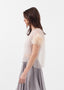 Haut en plumes d'organza