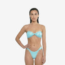 Front view of a model wearing the Missy 2P bikini set in a glossy wet-blue finish, featuring a twisted bandeau top and matching V-cut bottoms.