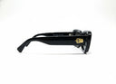 Black sunglasses with dark lenses on a white background