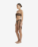 Side profile of the leopard-print two-piece swimsuit showcasing the high-cut leg and adjustable side-tie design on the bottoms.