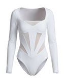 Bali swimwear shop featuring the Rose white long-sleeve bodysuit with UPF 50+ protection, sheer mesh details, and a durable bust support structure.