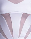 Macro shot of the white elastic mesh lining and star-shaped paneling on the bodysuit, showcasing the enclosed inner seams and premium texture.