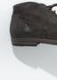 Listello Short Boot en boue