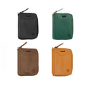  featuring secure zipper closure and minimalist card slots. Premium handmade accessory ideal for sustainable