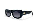 Black sunglasses with dark lenses on a white background