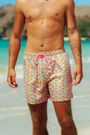Close-up of the Lollipop swim short fabric highlighting the colorful floral print, secure zipper pocket, and durable quick-dry material.